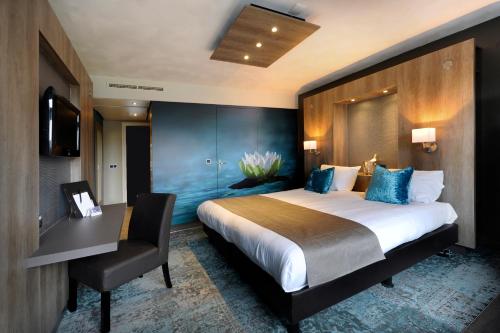Postel nebo postele na pokoji v ubytování Van der Valk Hotel Gilze-Tilburg