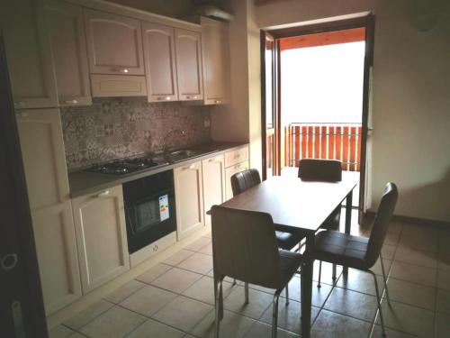 Kuchyň nebo kuchyňský kout v ubytování Residence La Pineta