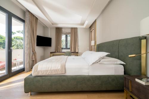 Postel nebo postele na pokoji v ubytování Hotel St.Mauritius