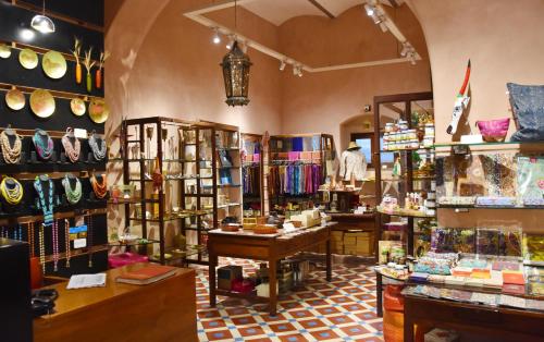 a store with a lot of items on display at The House of MG-A Heritage Hotel, Ahmedabad in Ahmedabad