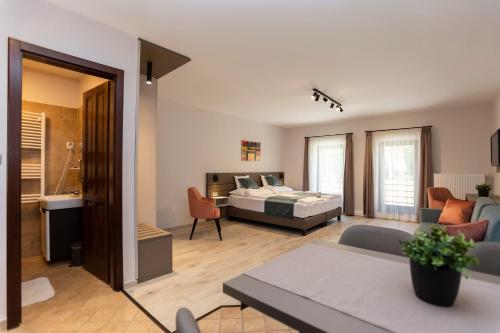 Postel nebo postele na pokoji v ubytování Végvár Spa Apartman