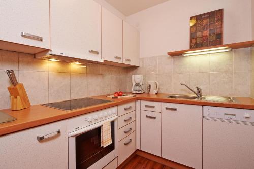 Una cocina o kitchenette en SkyLounge Mayrhofen