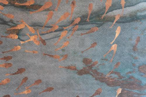 a close up oforangeprints on the side of a shirt at PICCOLA MAESTA' boutique rooms in Civitanova Marche