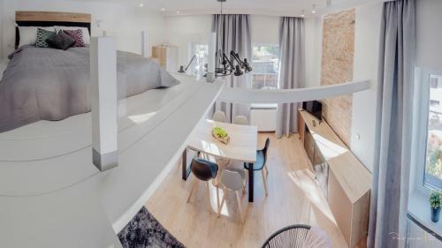 Posteľ alebo postele v izbe v ubytovaní Apartament LUX Cieplice