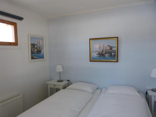 Letto o letti in una camera di Sangis Motell och Camping