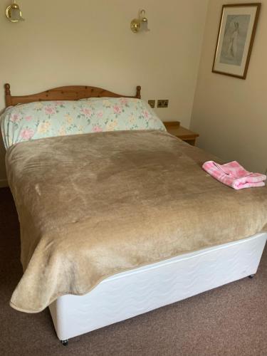 Cama ou camas em um quarto em Old Gloucester Road farm bed and breakfast