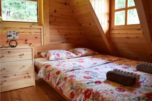 En eller flere senge i et værelse på Drinska Tisina