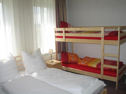 Divstāvu gulta vai divstāvu gultas numurā naktsmītnē Adler Hotel Dresden