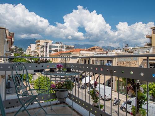a balcony with a view of a city at Lycurgus - The Spartan Home in Sparti