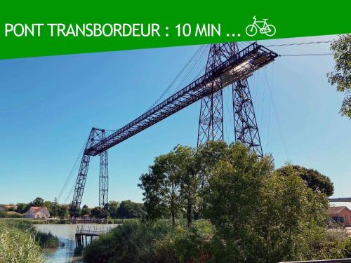 a tall bridge over a river with the words point transbourg at Bleu Soleil Rochefort 3 étoiles in Rochefort