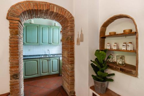 Kuchyň nebo kuchyňský kout v ubytování Il Torrino Country Resort