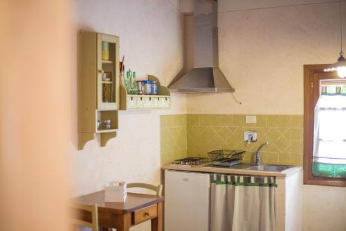 A kitchen or kitchenette at Casa Emma by HelloElba