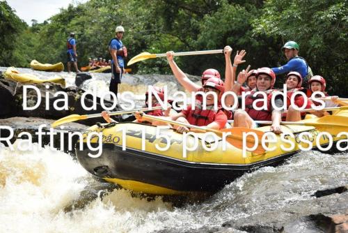 a group of people on a raft on a river at Pousada Alvorada Brotas - e agendamento das atividades turísticas in Brotas