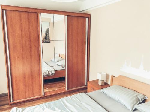 Un ou plusieurs lits dans un hébergement de l'établissement Apartment and rooms Maraton