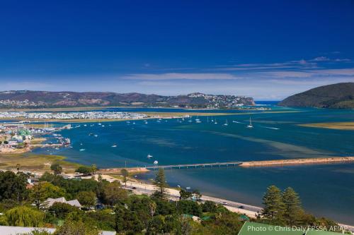 an aerial view of a harbor with boats in the water at Paradise Found in Knysna