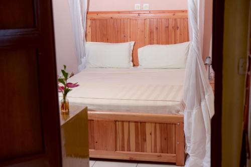 Postel nebo postele na pokoji v ubytování Botanika Hotel