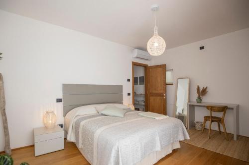 La Suite con Piscina Privataにあるベッド