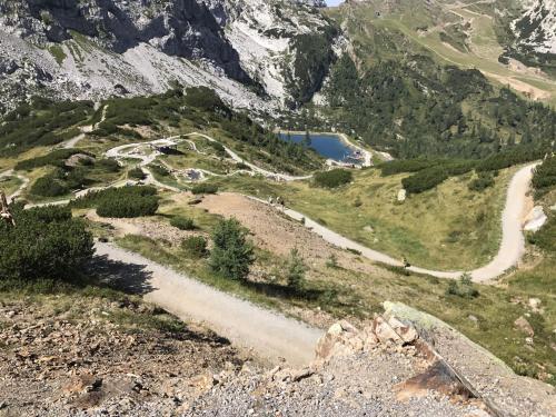 a view of a mountain with a road and a lake at Apartment Sophia in Sonnenalpe Nassfeld