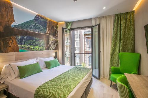Hotel Brö-Adults Recommended tesisinde bir odada yatak veya yataklar