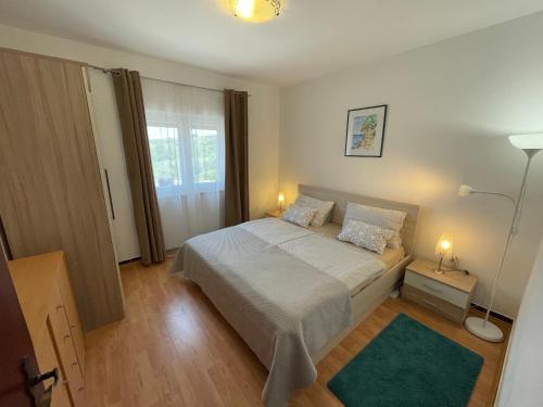 En eller flere senge i et værelse på Villa Croatia