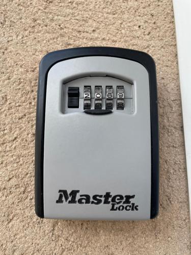a maserati lock is sitting on the floor at Le petit écrin champenois in Étoges