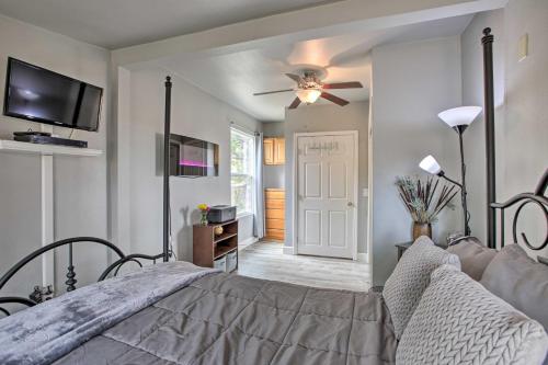 a bedroom with a bed and a ceiling fan at Cozy Abode with Patio, 16 Mi to San Luis Obispo in Atascadero