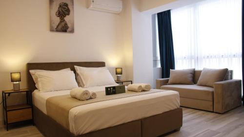 Un pat sau paturi într-o cameră la Mamaia Nord Bel Air
