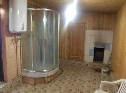 a bathroom with a shower in a room at Отдых в Капшагае! in Kapchagay