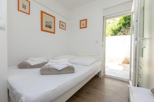 Katil atau katil-katil dalam bilik di Sea Sound Apartments Rea