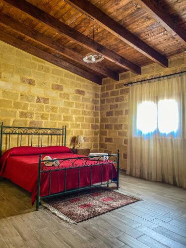 Ένα ή περισσότερα κρεβάτια σε δωμάτιο στο Casa Patrizia