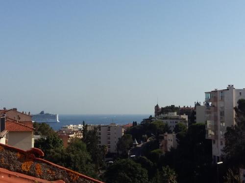a view of the ocean from a city at Happydays Cannes spacieux duplex 70m2 in Cannes