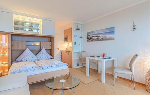 Ein Bett oder Betten in einem Zimmer der Unterkunft Lovely Apartment In Timmendorfer Strand With Heated Swimming Pool