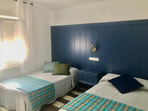 Postel nebo postele na pokoji v ubytování Casa rural La Quinta De Lara