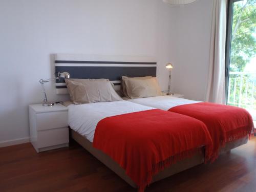 Cama o camas de una habitación en Sea front apartment - Princesa D. Amélia