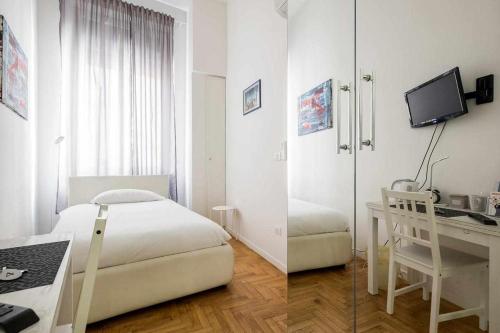 ボローニャにあるCavalieri's Grandのベッドルーム1室(ベッド1台、デスク、コンピュータ付)