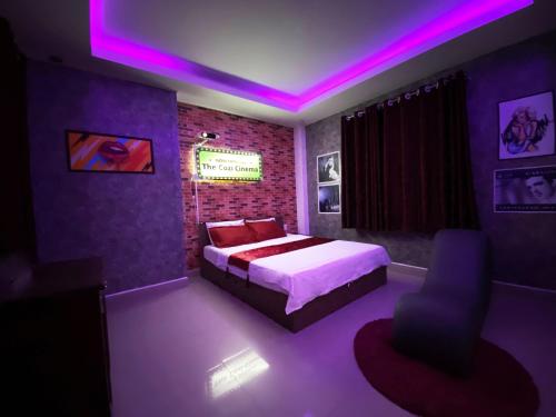 Cozi 9 Hotel - Theme Hotelにあるベッド