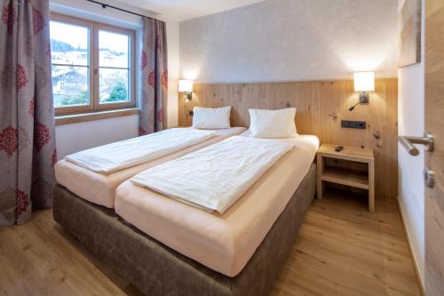 Katil atau katil-katil dalam bilik di Hotel Gasthof Obermair