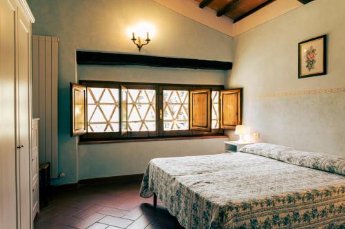 Katil atau katil-katil dalam bilik di Il Leccio