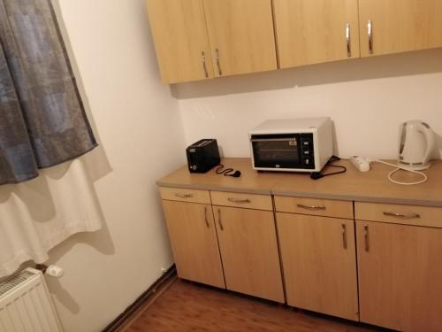 Η κουζίνα ή μικρή κουζίνα στο Apartament S&F