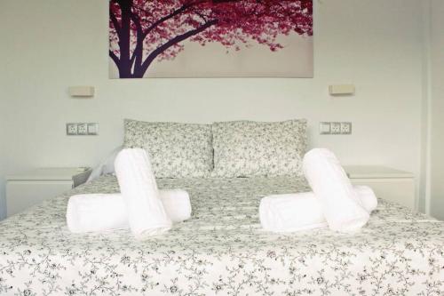 Ένα ή περισσότερα κρεβάτια σε δωμάτιο στο Precioso Apartamento Los Álamos Playa Golf