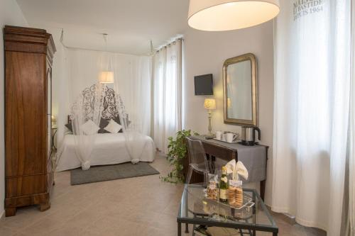 Cama o camas de una habitación en Albergo Al Castello