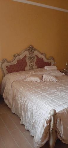 Кровать или кровати в номере Bebeldar Jiudicissa Eleonora de Arborea B&B
