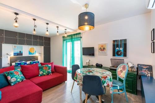 Posedenie v ubytovaní Boutique triple house with garden & roof terrace