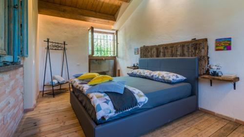Ένα ή περισσότερα κρεβάτια σε δωμάτιο στο Villa Malu