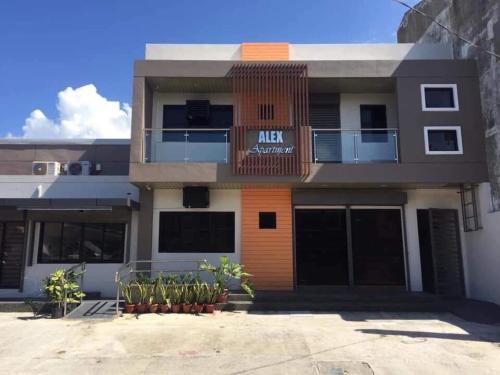 an apartment building with a sign on it at Reddoorz @ Sta Cruz Naga City in Naga