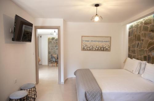 Postel nebo postele na pokoji v ubytování Key Villas