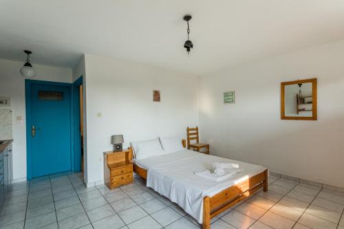 Postel nebo postele na pokoji v ubytování Penelope Apartments