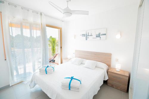 Кровать или кровати в номере Apartamento Familiar Leomar