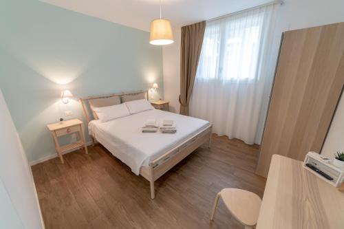 Postel nebo postele na pokoji v ubytování Natura e Mente Camere e Relax