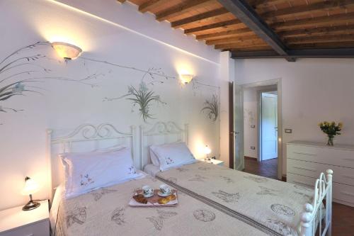 เตียงในห้องที่ Villa Paradiso